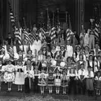 Large crowd of people in different national costumes