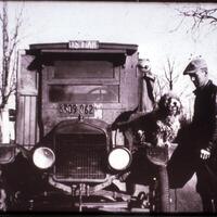 Charles Benson, mail carrier, with dog Pete