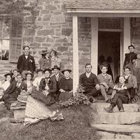 Group photo in front of Jean Hasbrouck house