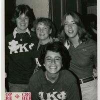 Four girls smiling