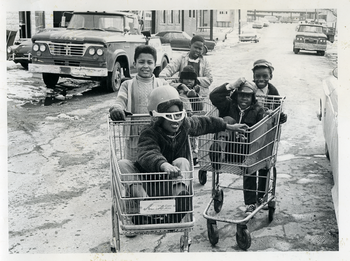 Children with shopping carts