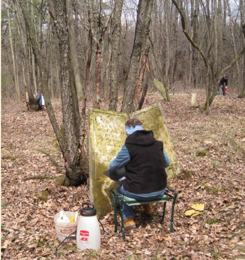 volunteer cleaning gravestones, 2013