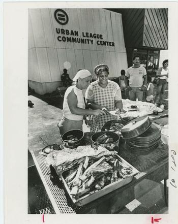 Serving food at the Broome County Urban League Festival