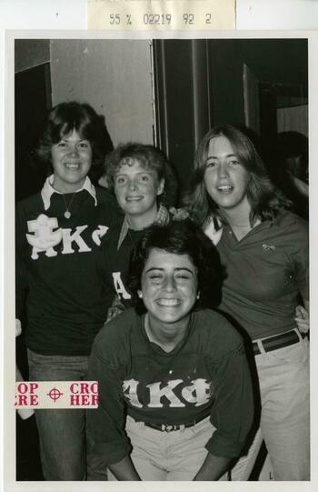 Four girls smiling