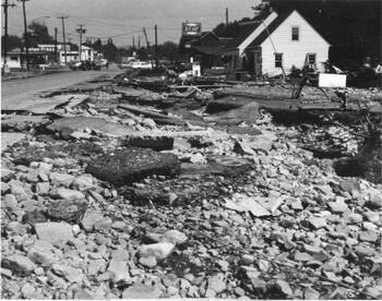 Ripped up pavement and debris along West Pulteney Street near the Tastee-Freez