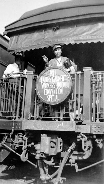 Fannia Cohn waves from an ILGWU Special Convention Train.